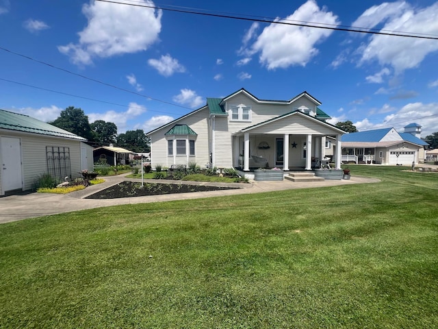 52 3rd St SE, Newark, OH 43055 - view of front of property with a front lawn and a porch
