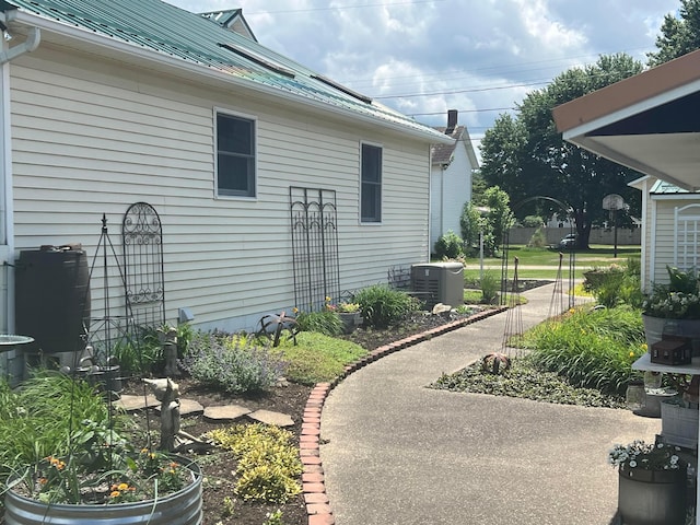 52 3rd St SE, Newark, OH 43055 - view of side of property with central AC unit and metal roof