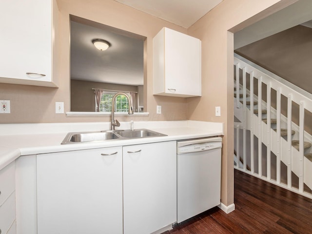5690 Kilbury Ln Unit 120D, Hilliard, OH 43026 - kitchen featuring dishwasher, white cabinets, dark wood-type flooring, and light countertops