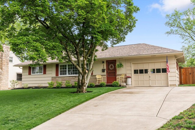 single story home featuring an attached garage, concrete driveway, and a shingled roof