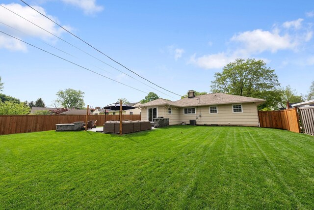 rear view of house featuring an outdoor living space and cooling unit