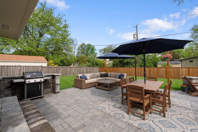 view of patio / terrace featuring an outdoor hangout area, area for grilling, and outdoor dining space