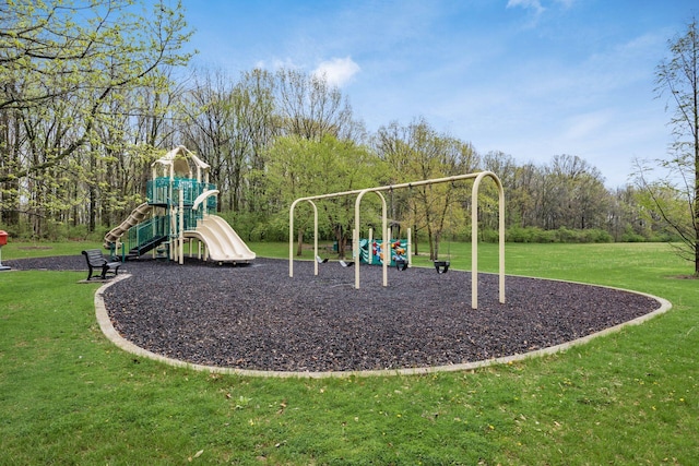 community playground featuring a lawn