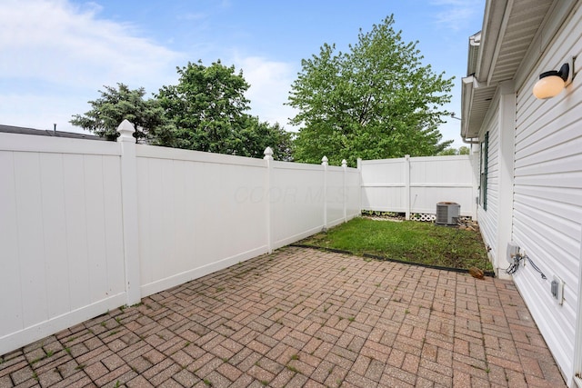 6709 Axtel Dr Unit 5A, Canal Winchester, OH 43110 - view of patio / terrace featuring cooling unit and a fenced backyard