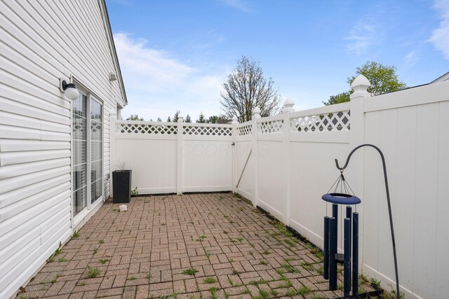 6709 Axtel Dr Unit 5A, Canal Winchester, OH 43110 - view of patio / terrace with a fenced backyard and cooling unit