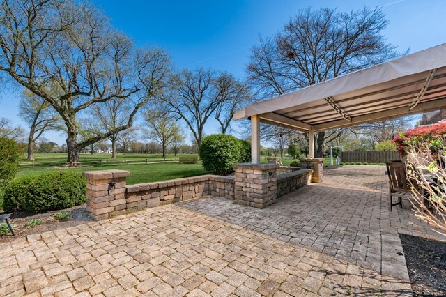 view of patio / terrace with a gazebo and fence