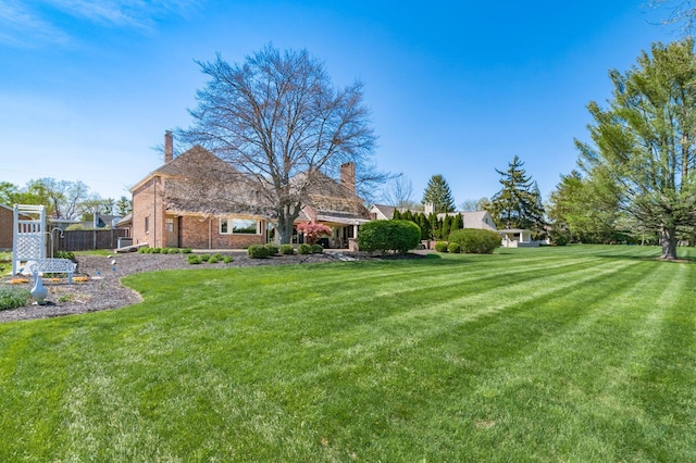 view of yard with fence