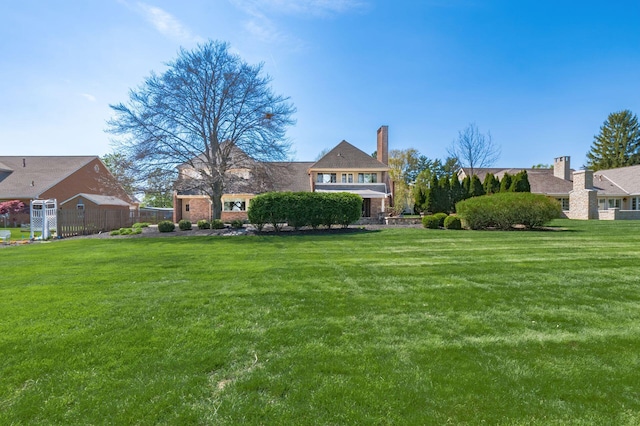 view of yard featuring fence