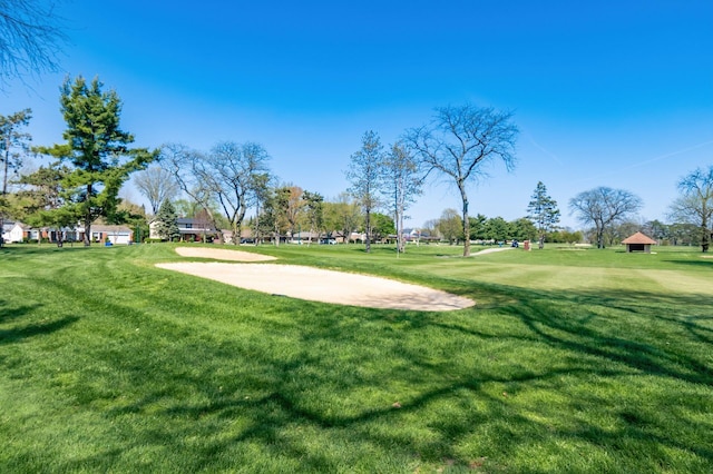 surrounding community with a yard