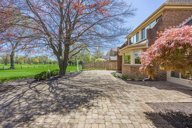 view of patio with fence
