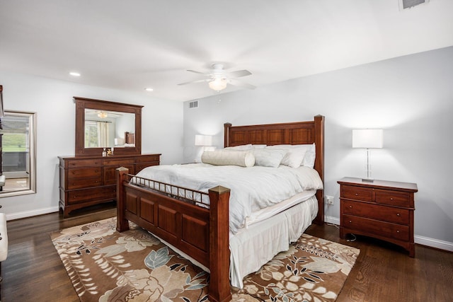 bedroom with a ceiling fan, baseboards, visible vents, and dark wood-style floors
