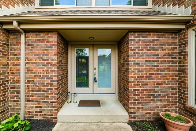 4070 Lyon Dr, Upper Arlington, OH 43220 - view of exterior entry with brick siding and french doors