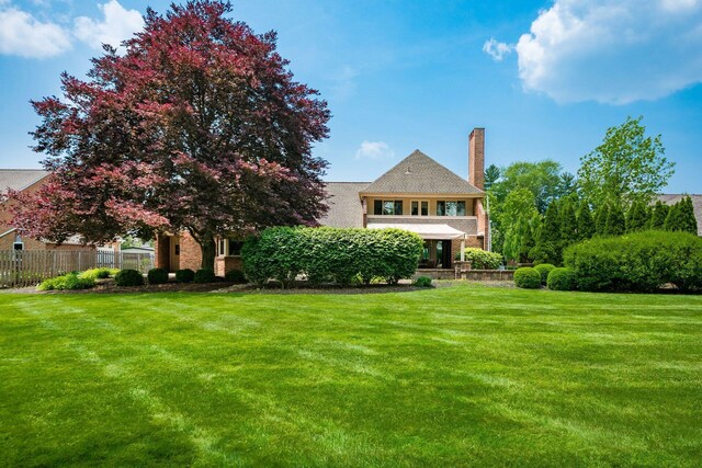 4070 Lyon Dr, Upper Arlington, OH 43220 - back of property with a chimney and brick siding