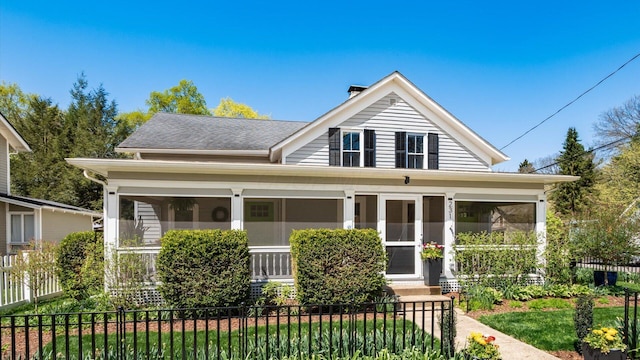 231 N Granger St, Granville, OH 43023 - farmhouse inspired home featuring a sunroom, fence, and a shingled roof