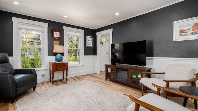 231 N Granger St, Granville, OH 43023 - sitting room featuring wainscoting, wood finished floors, recessed lighting, and ornamental molding
