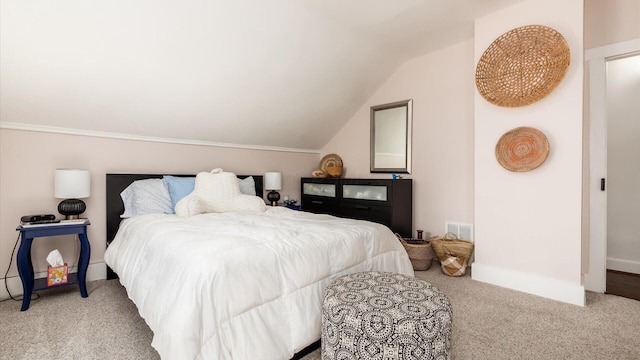 231 N Granger St, Granville, OH 43023 - bedroom with carpet, visible vents, lofted ceiling, and baseboards