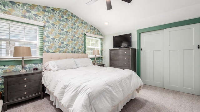 231 N Granger St, Granville, OH 43023 - bedroom with wallpapered walls, vaulted ceiling, carpet floors, and a closet