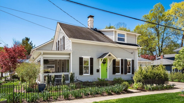 231 N Granger St, Granville, OH 43023 - view of front of house featuring a shingled roof, a chimney, and a fenced front yard