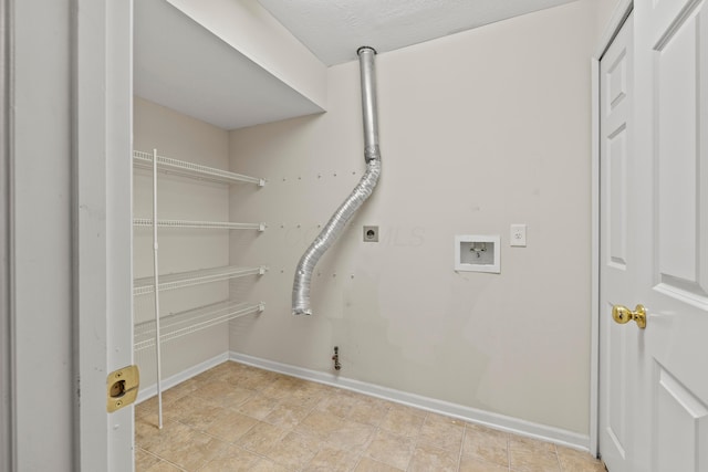 washroom with hookup for a gas dryer, hookup for a washing machine, baseboards, electric dryer hookup, and light tile patterned flooring