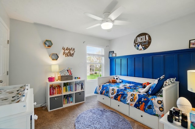bedroom featuring carpet floors, ceiling fan, and baseboards