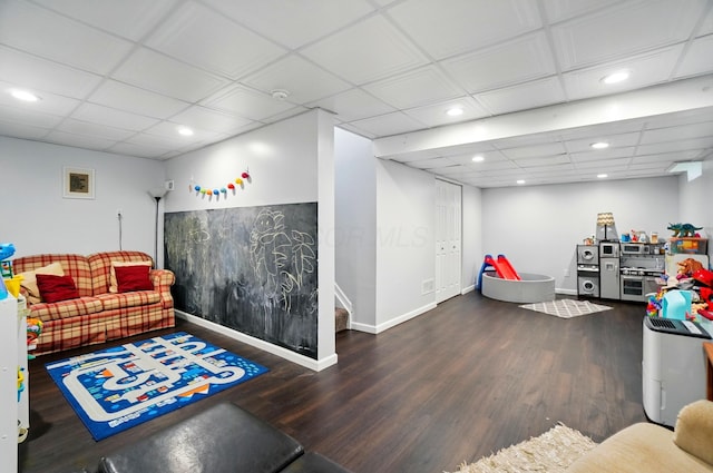 rec room featuring recessed lighting, baseboards, and wood finished floors