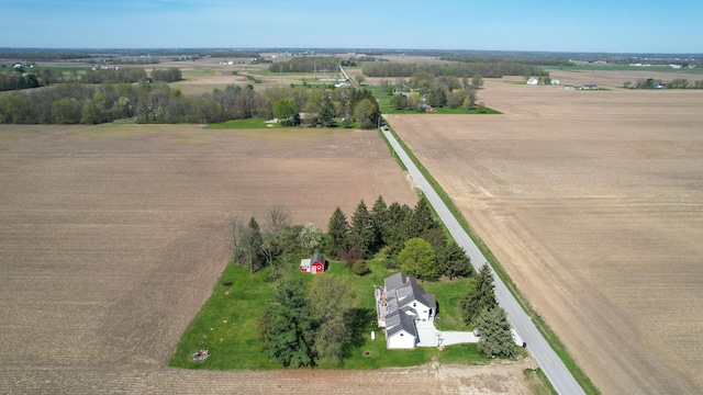 birds eye view of property featuring a rural view