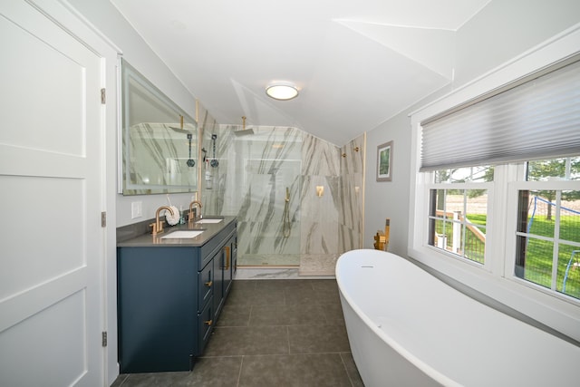 full bath with tile patterned floors, double vanity, a marble finish shower, and a sink