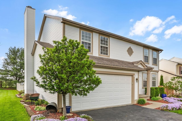 1616 Saddlebrook Dr, Heath, OH 43056 - traditional-style home with a garage, driveway, and a chimney