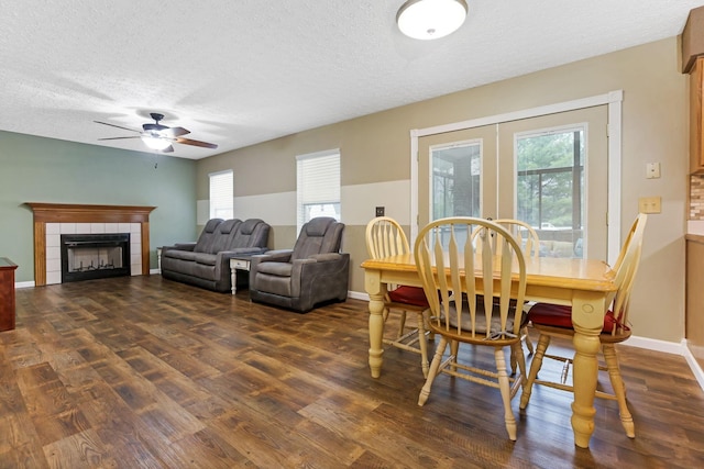 1616 Saddlebrook Dr, Heath, OH 43056 - dining space with a textured ceiling, dark wood finished floors, ceiling fan, and a wealth of natural light