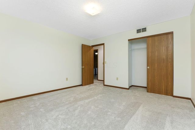 1616 Saddlebrook Dr, Heath, OH 43056 - unfurnished bedroom featuring baseboards, light carpet, a closet, and visible vents