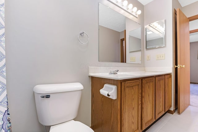 1616 Saddlebrook Dr, Heath, OH 43056 - bathroom featuring vanity, tile patterned flooring, and toilet