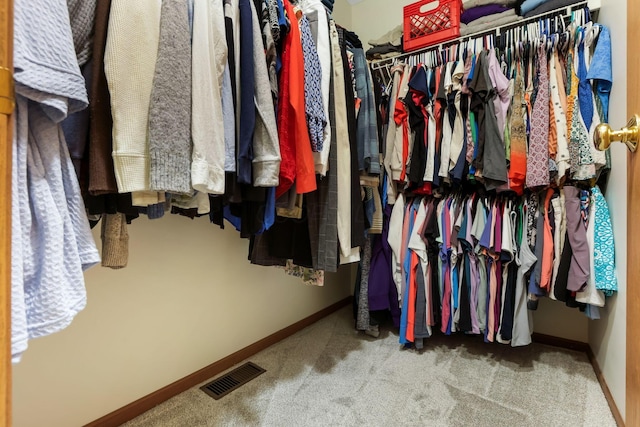 1616 Saddlebrook Dr, Heath, OH 43056 - walk in closet with visible vents and carpet