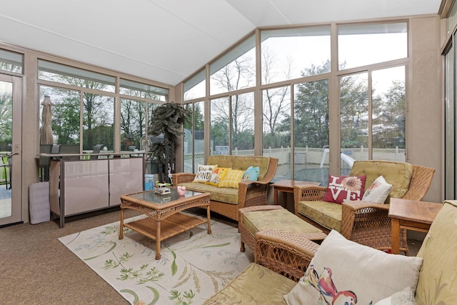 1616 Saddlebrook Dr, Heath, OH 43056 - sunroom / solarium featuring carpet flooring, vaulted ceiling, floor to ceiling windows, and an outdoor hangout area