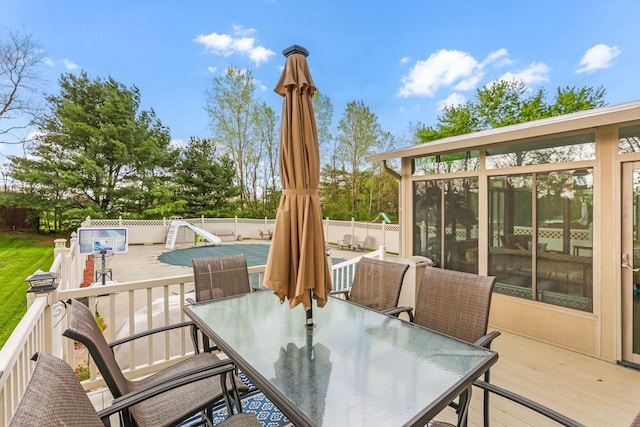 1616 Saddlebrook Dr, Heath, OH 43056 - exterior space featuring a fenced backyard, a fenced in pool, outdoor dining space, and a deck