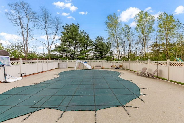 1616 Saddlebrook Dr, Heath, OH 43056 - view of pool featuring a patio, a water slide, a fenced backyard, and a fenced in pool