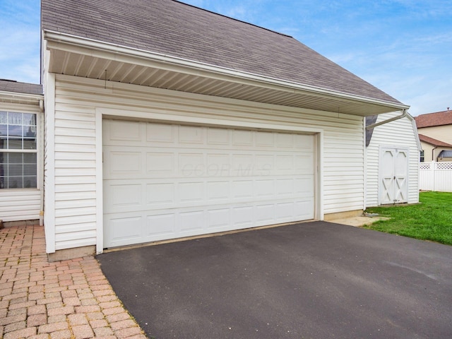garage with driveway