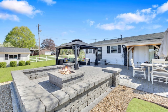 757 State Rte 61, Sunbury, OH 43074 - view of patio featuring fence, a fire pit, and a gazebo