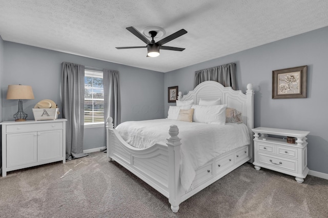 757 State Rte 61, Sunbury, OH 43074 - carpeted bedroom with a textured ceiling, ceiling fan, and baseboards