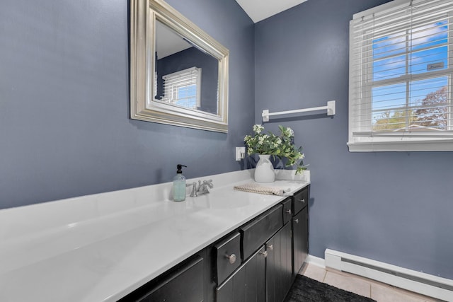 757 State Rte 61, Sunbury, OH 43074 - bathroom with baseboards, tile patterned flooring, vanity, and a baseboard radiator