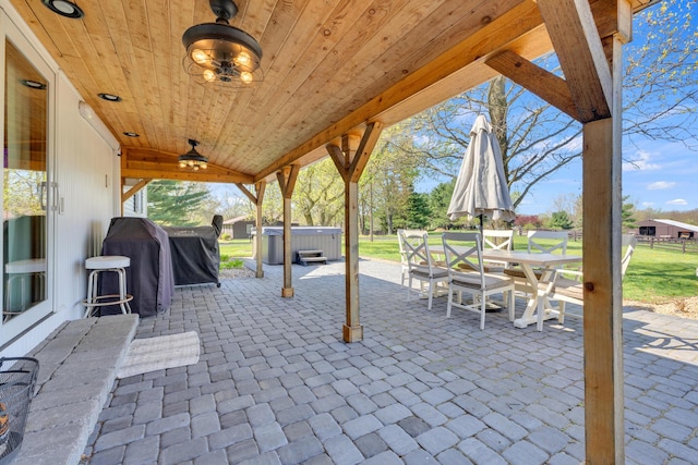 757 State Rte 61, Sunbury, OH 43074 - view of patio / terrace featuring fence, outdoor dining space, and a hot tub
