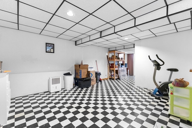 finished below grade area featuring recessed lighting and tile patterned floors