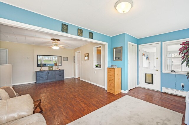 8870 College St, Lakeview, OH 43331 - living room featuring plenty of natural light, a ceiling fan, and wood finished floors