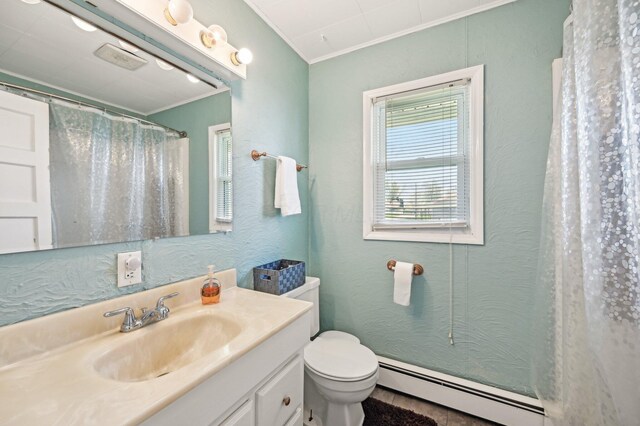 8870 College St, Lakeview, OH 43331 - bathroom with toilet, vanity, a shower with curtain, crown molding, and baseboard heating