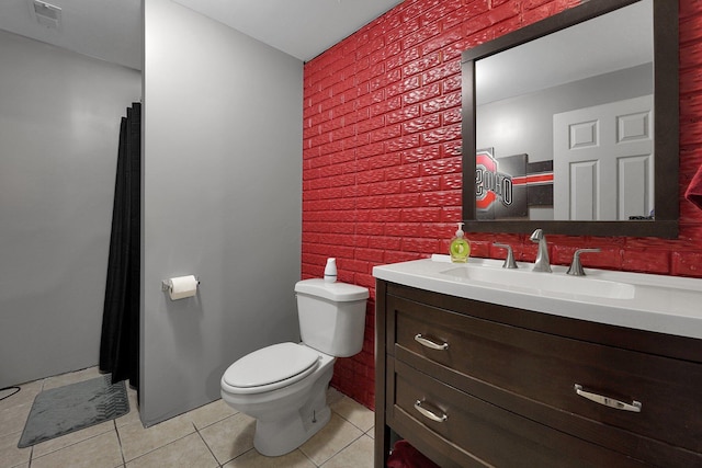 full bathroom featuring tile patterned floors, toilet, visible vents, an accent wall, and vanity