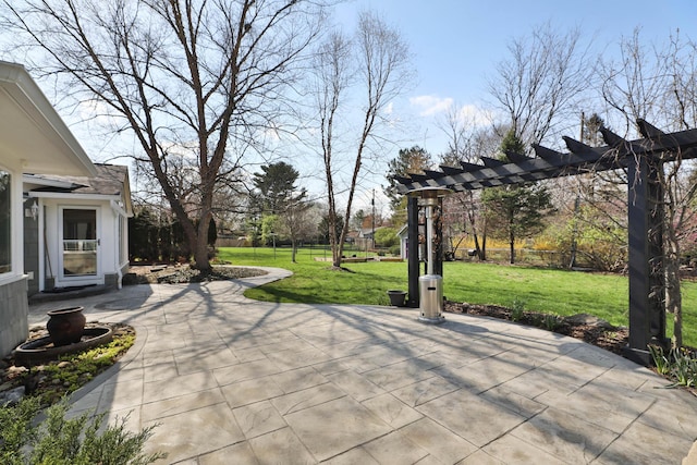 view of patio with fence and a pergola