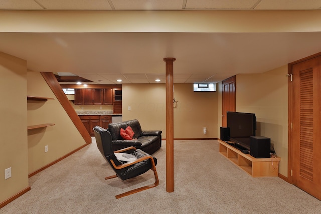 living room with recessed lighting, baseboards, light colored carpet, and a paneled ceiling