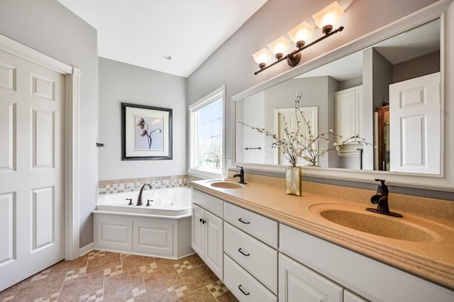 full bath with double vanity, baseboards, a bath, and a sink