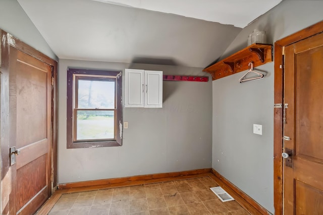 interior space featuring visible vents and baseboards