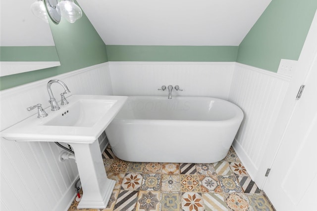 250 E Park St, Westerville, OH 43081 - full bath with tile patterned floors, wainscoting, and a soaking tub