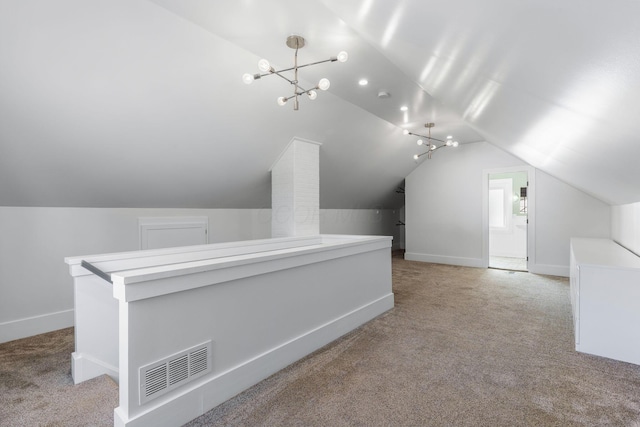 250 E Park St, Westerville, OH 43081 - bonus room with carpet floors, an inviting chandelier, baseboards, lofted ceiling, and visible vents